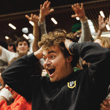 USF students celebrating at a basketball game