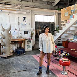 Paz G in an art studio