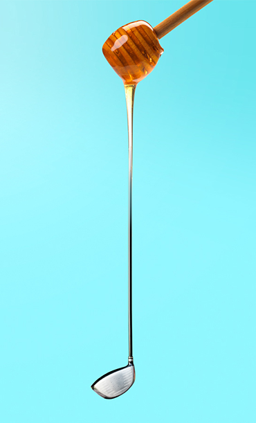 Artist rendering of honeycomb dripping into golf club.