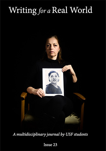 Writing for a Real World Issue 23 Cover featuring a woman holding a photo of her missing sister