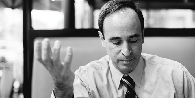 Ken Goldstein at a restaurant booth