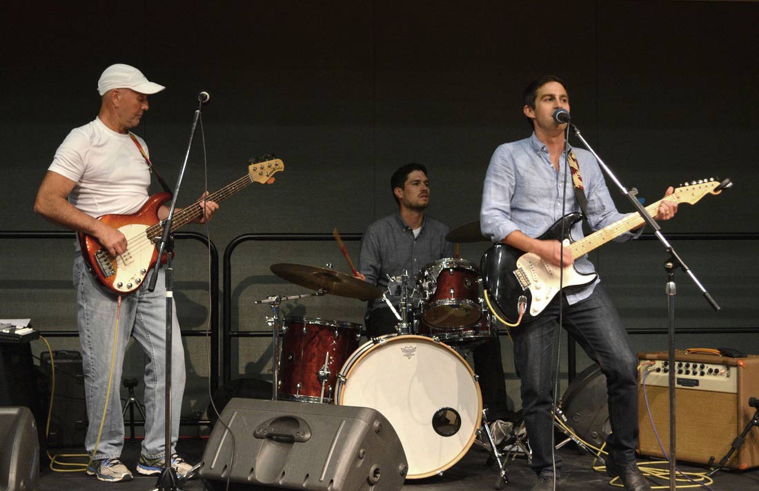 Public Administration Assistant Professor William (Billy) Riggs playing with band