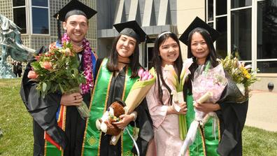 Students in graduation gowns