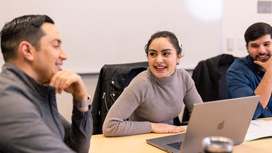 Students in class, smiling