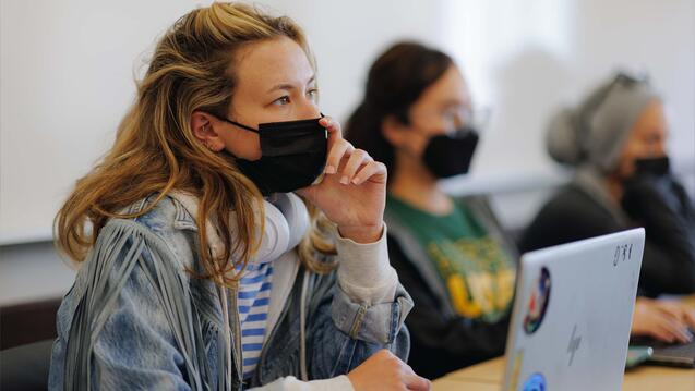 Student listens attentively in class