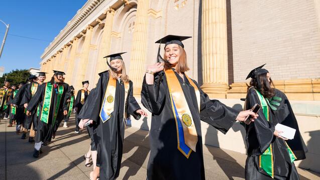 Graduates in front of St. Ignatius