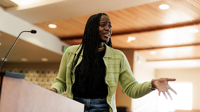 student speaks over podium