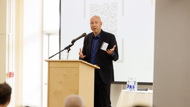 Person speaking at a podium at Innovation Summit