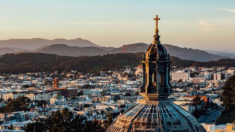 Dome of St Ignatius Church with the city behind.