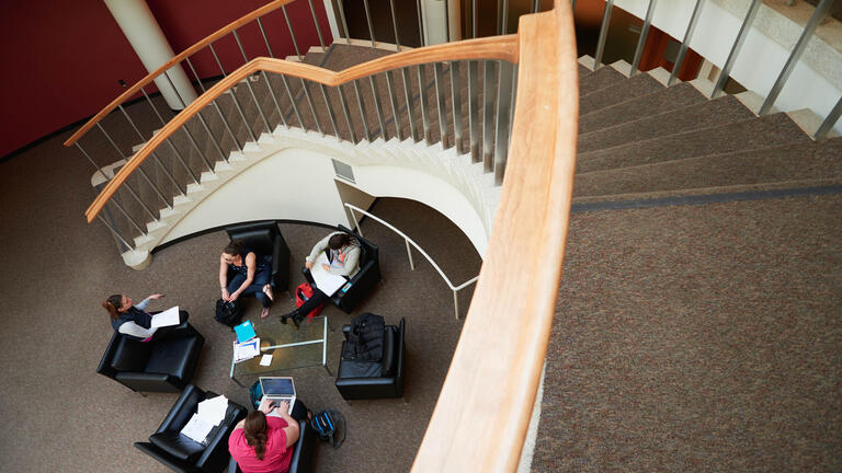 Students collaborating in common area.