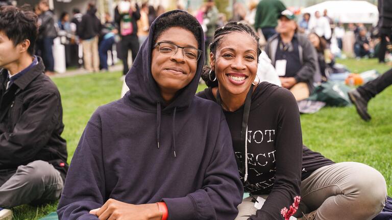 Student and parent in Gleeson Plaza