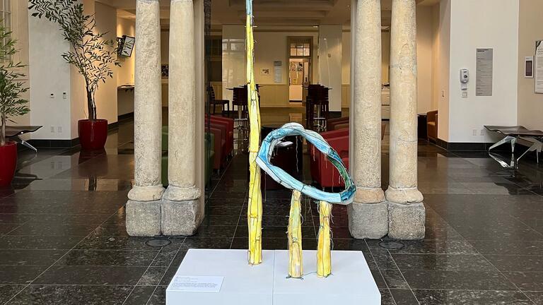 Mercy Hawkins sculptures located in the Kalmanovitz Hall atrium.