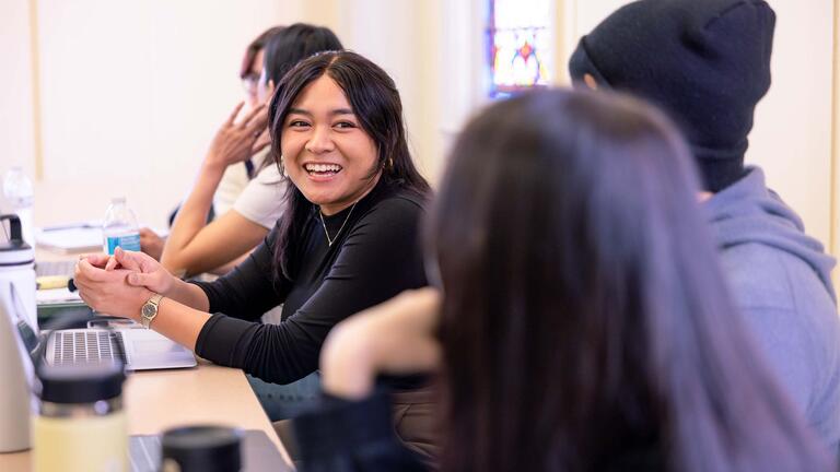 Student smiling in class