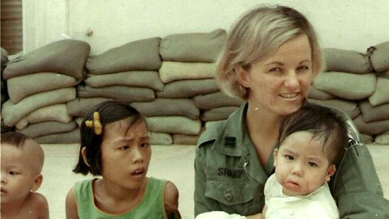 Linda Sharp with kids on her orthopedic unit