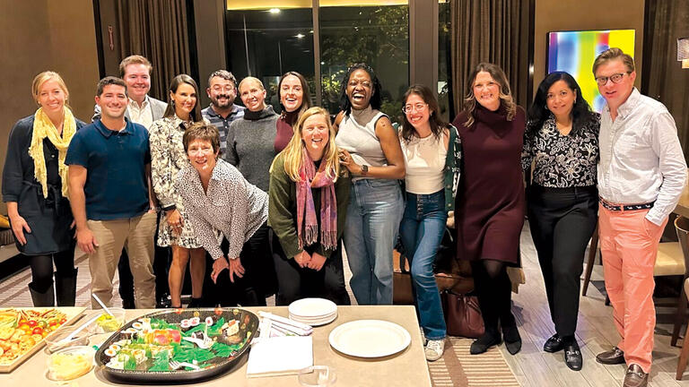 USF alumni gathered in a group photo