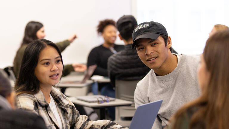 students chatting in the classroom