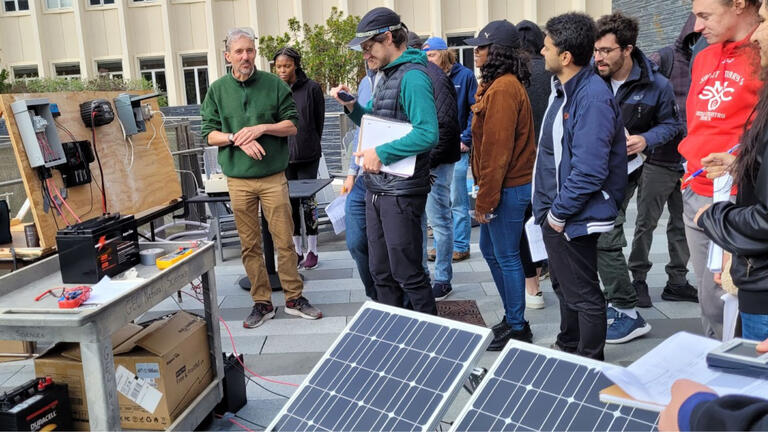 group of students build energy panels