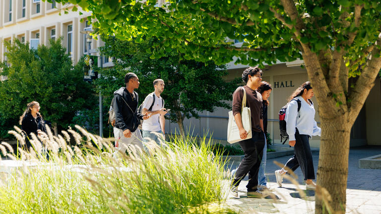 group of students walking on campus