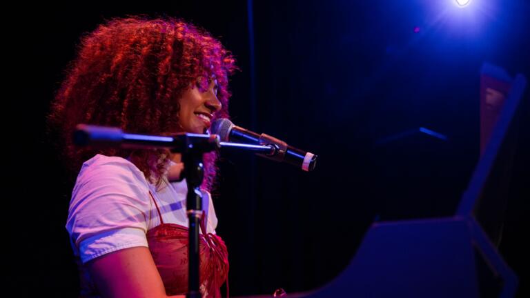 Student playing piano in Studio Theater