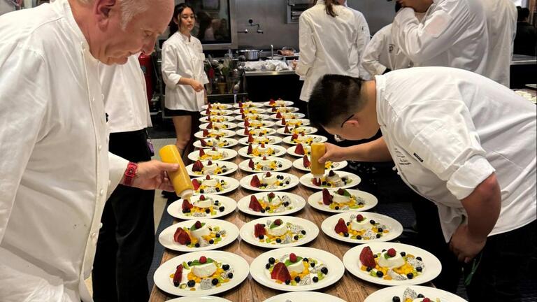 Students plating food