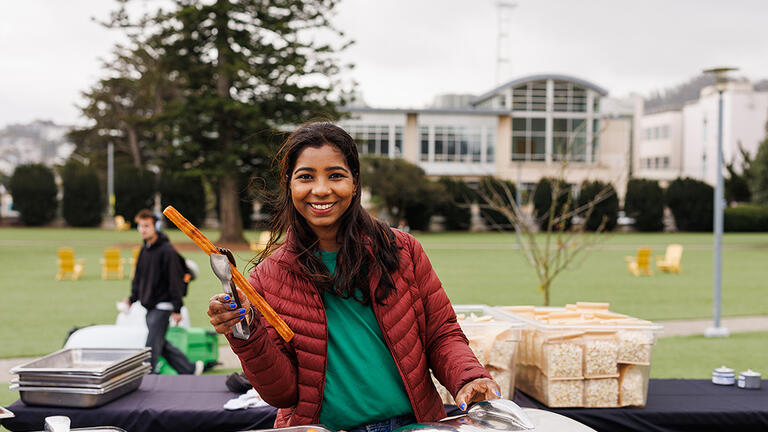 Volunteer at the churro station
