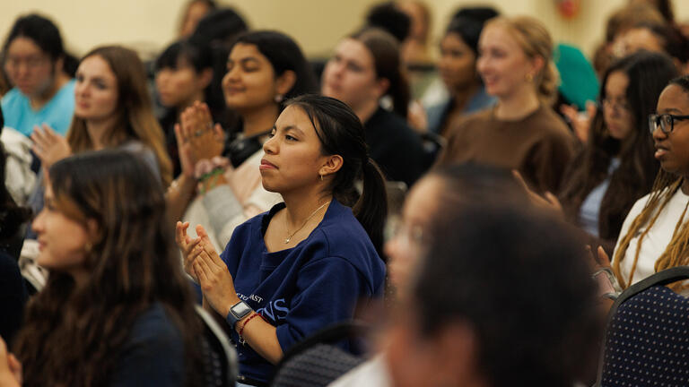 audience members clapping during CDS event