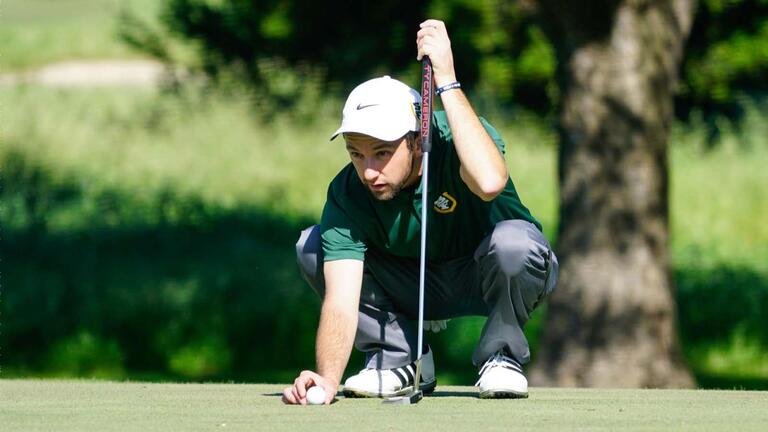 golfer setting up for his final putt
