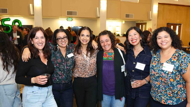 Group of six women standing for a photo