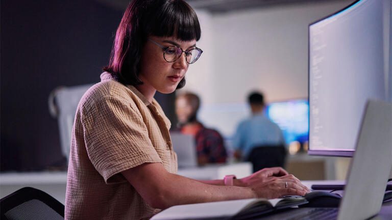 Student working on computer.