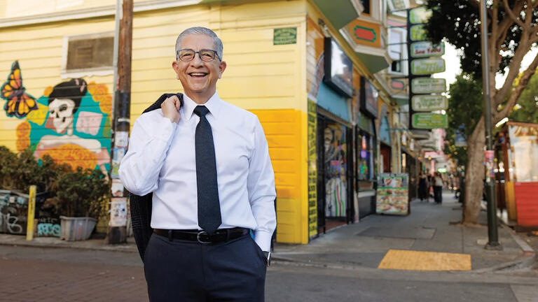 President Aceves smiling.