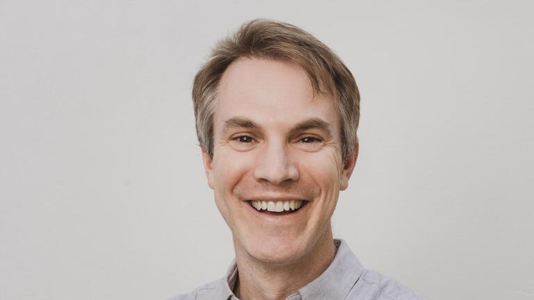 Headshot of the speaker