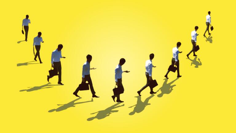 Business man walking in arc