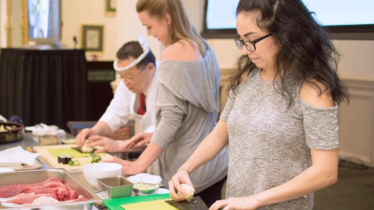 Masayoshi Kazato, and his son, travel from Japan to teach sushi skills course on their seminar tour