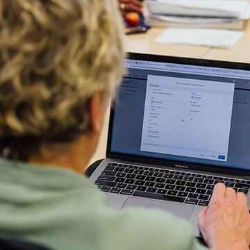 Women typing on laptop