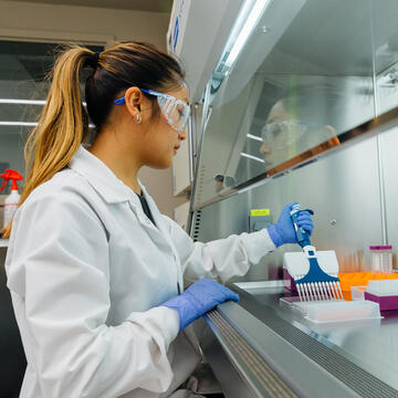 Student prepares samples in a Biotech lab