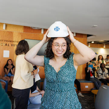 Student with hard hat.