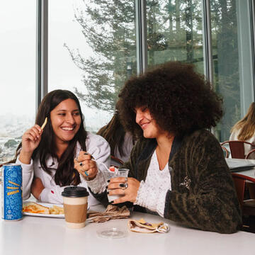 students eating in koret lodge