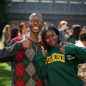 Two students posing 