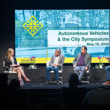 panelists on stage