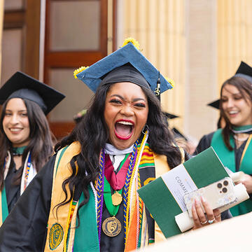 USF student in cap and gown