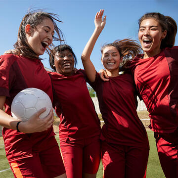 Four women's soccer players