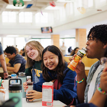 Group of USF students chatting and laughing