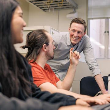 students talk in class