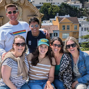 USF alumni gathered at the top of Lone Mountain