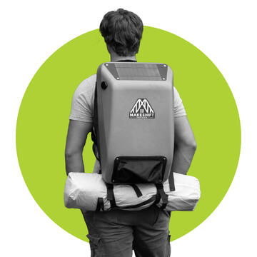 Zac Clark wearing backpack for unhoused people