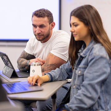 Two USF Orange county campus students in classroom