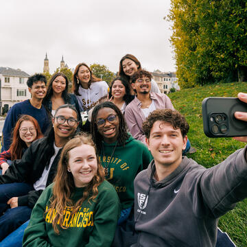 Group of students taking a selfie together on Lone Mountain