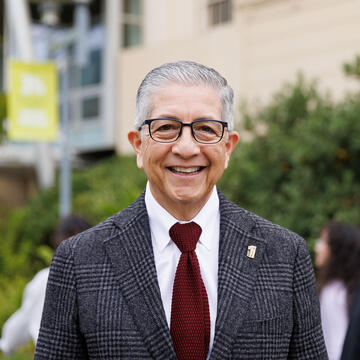 President Aceves smiling.