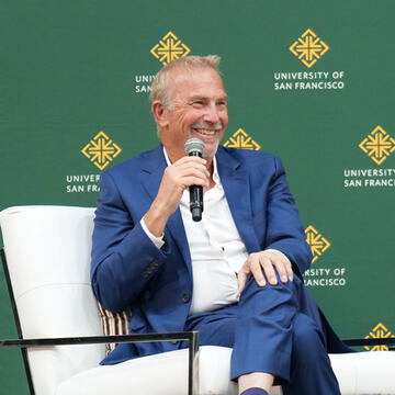 Kevin Costner on stage at the Silk Speaker Series