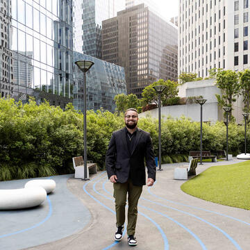 students walks around Salesforce Park in downtown San Francisco